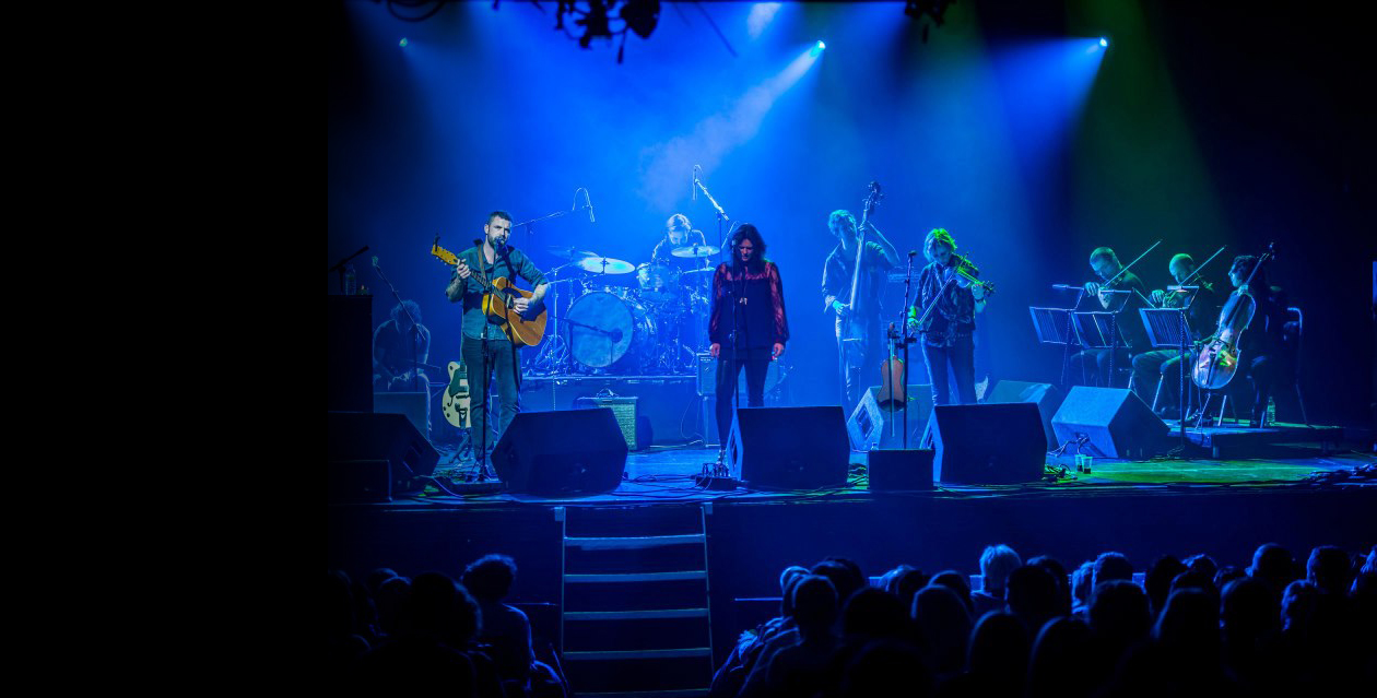 Bohemian Strings ensemble performing as a live backing section on a concert stage in The Olympia Theatre